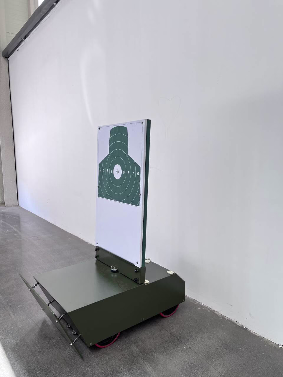 H-bar ground rail moving pop-up target